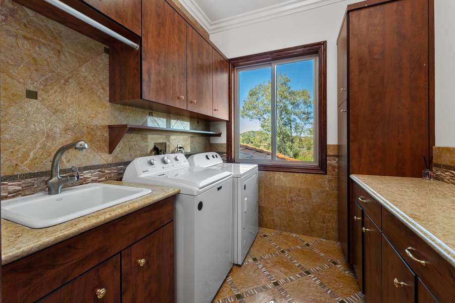 The whirlpool tub sits where the window does the decorating.