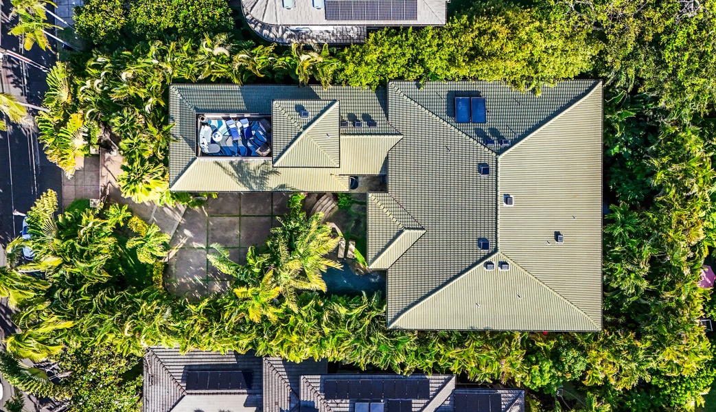 Overhead view of Pili Pono estate tucked in tropical greenery.