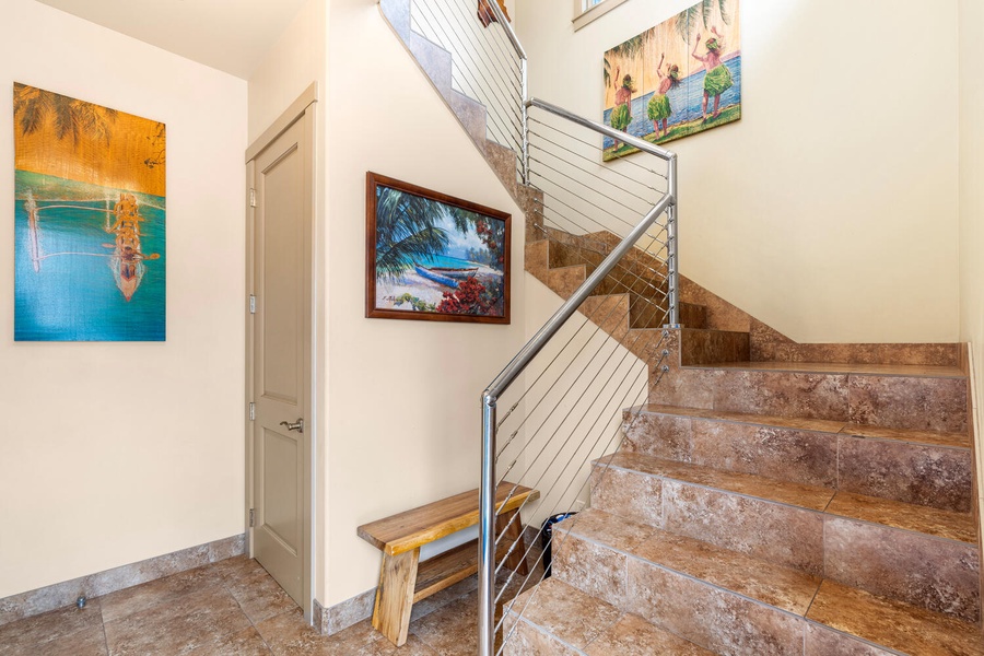 Local artwork lines the stairwell connecting all three levels, but an elevator stands by for beach-tired legs and effortless luggage transfers.