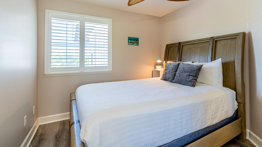 The second guest bedroom with a comfortable setting for a restful stay.