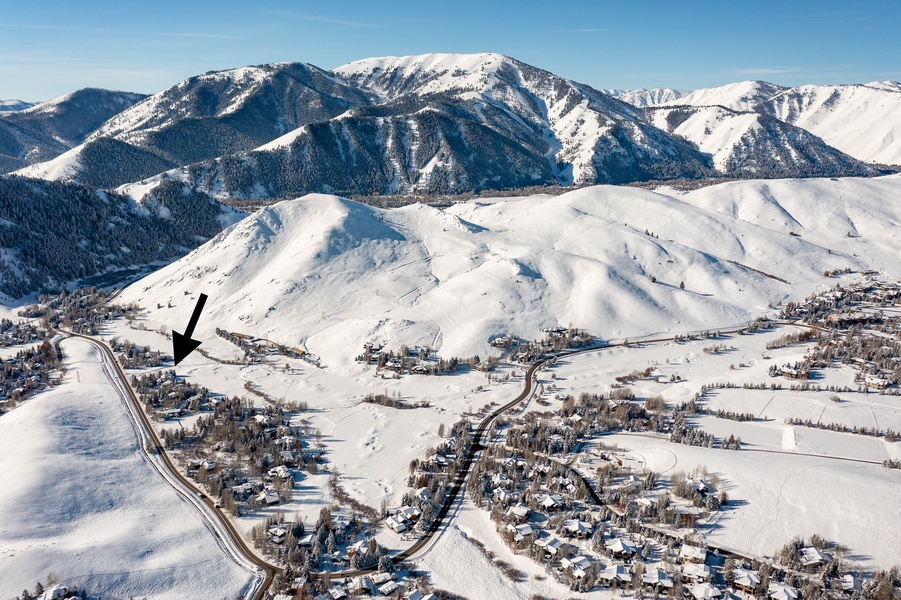 Aerial shot of the unit's location and the fine mountainous backdrop.