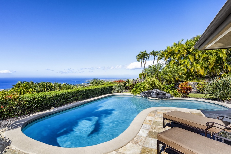 Relax in the pool while taking in the Kona Coast!