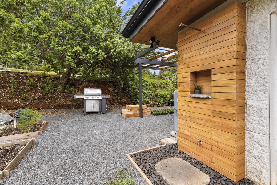 Custom outside shower great for rinsing off after surf sessions or beach days.
