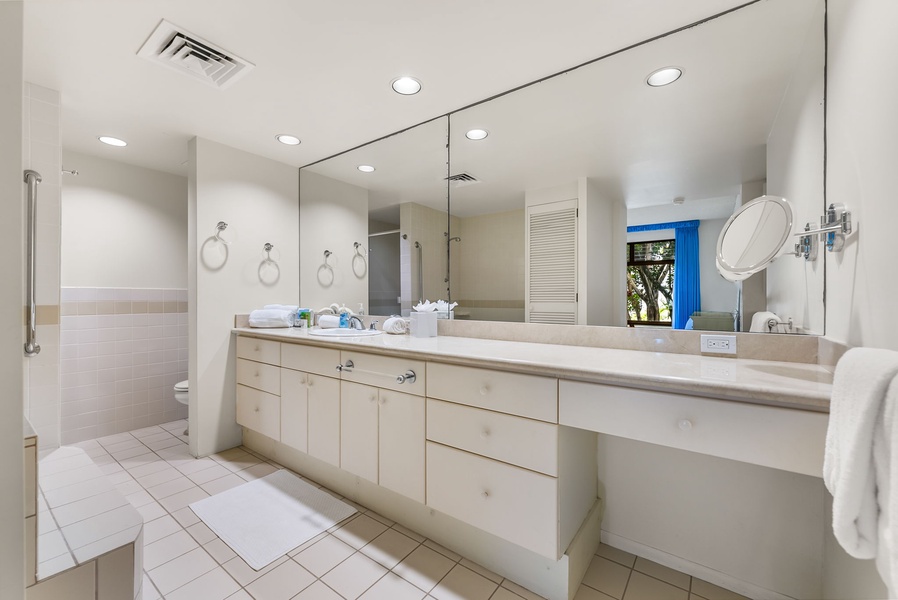 Ample vanity space in the ensuite bath.