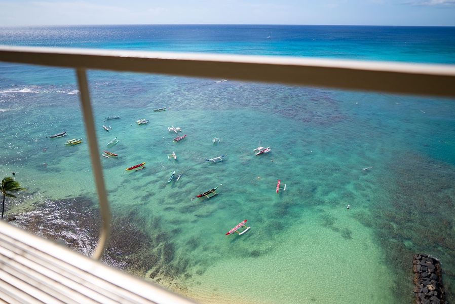 Stunning turquoise waters and colorful boats create a tropical paradise visible from your window seating.