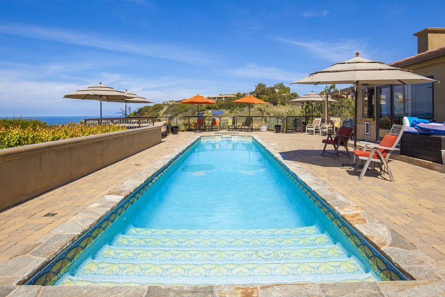 Welcoming saltwater lap pool with ocean views