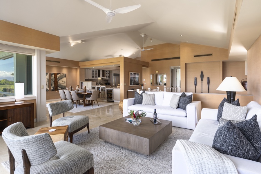 Palm Villas boast one of the largest floor plans of any Hualalai villa with a wide view from the great room towards the dining room and kitchen
