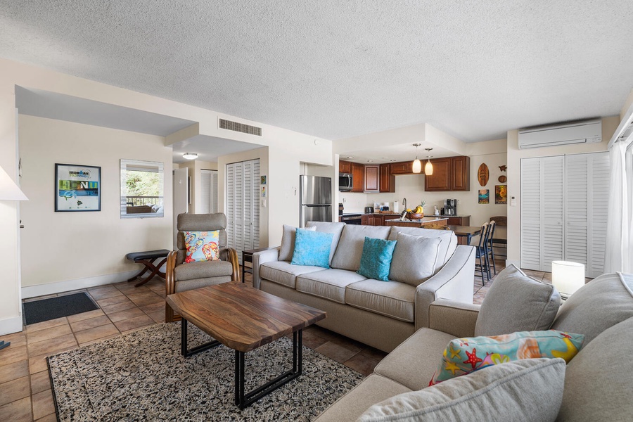 Open living space with Queen sleeper sofa tropical touches, and a fully equipped kitchen perfect for your stay.