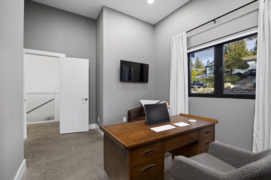 Dedicated office setup — ideal for remote work or quiet reflection with bay views nearby.