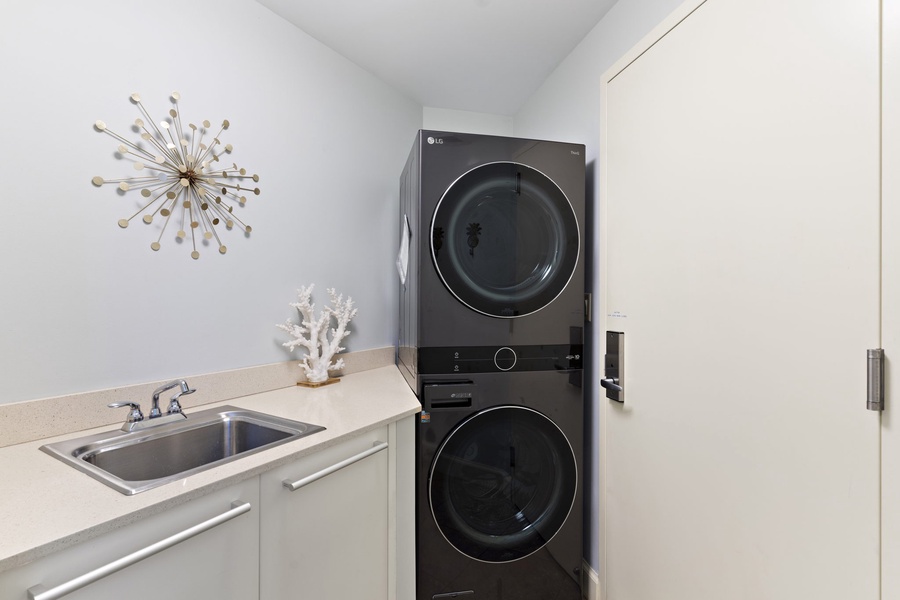 The in-unit laundry at Wailea Hoolei 93-3 includes a washer and dryer for added convenience.