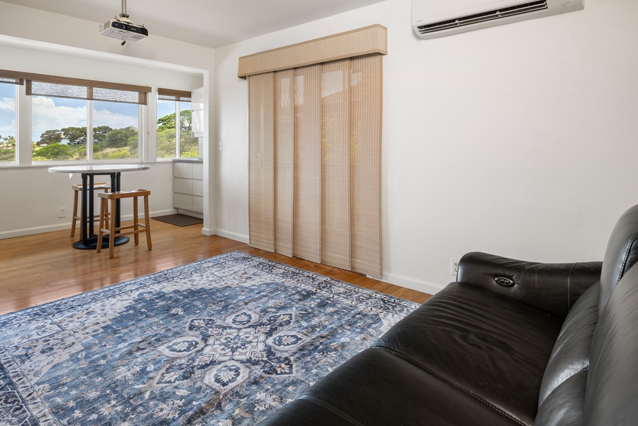 This bonus room can flex as a home office, reading lounge, or guest space—ideal for long-term stays or hybrid work setups.