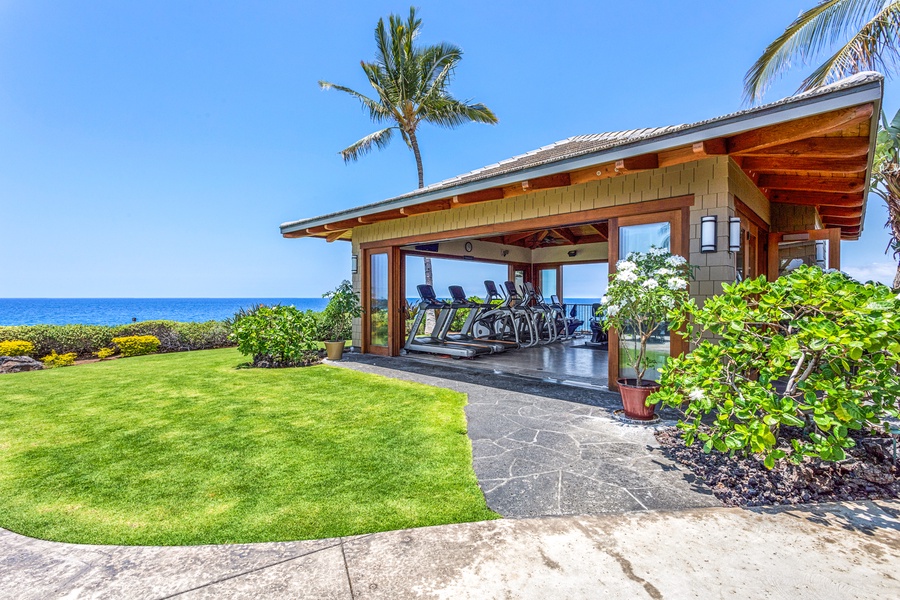Hali’i Kai’s epic open air fitness center with panoramic ocean and coastline views.
