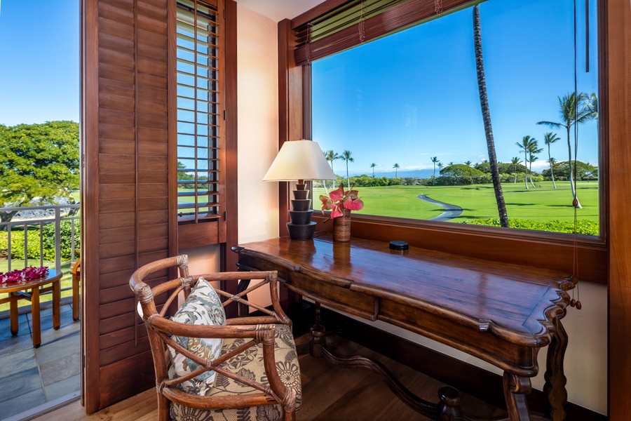 Your private workspace overlooks pristine golf greens and swaying palms, where warm trade winds drift through wooden shutters.