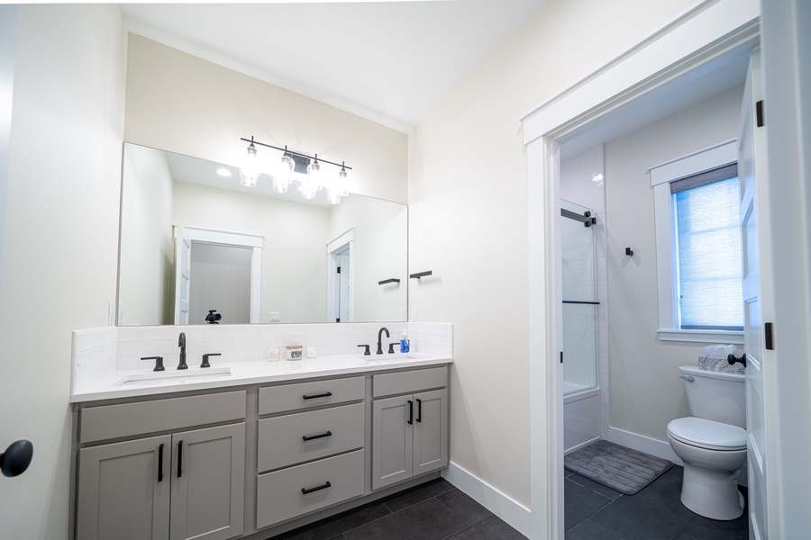 Guest bathroom is shared with both guest bedrooms