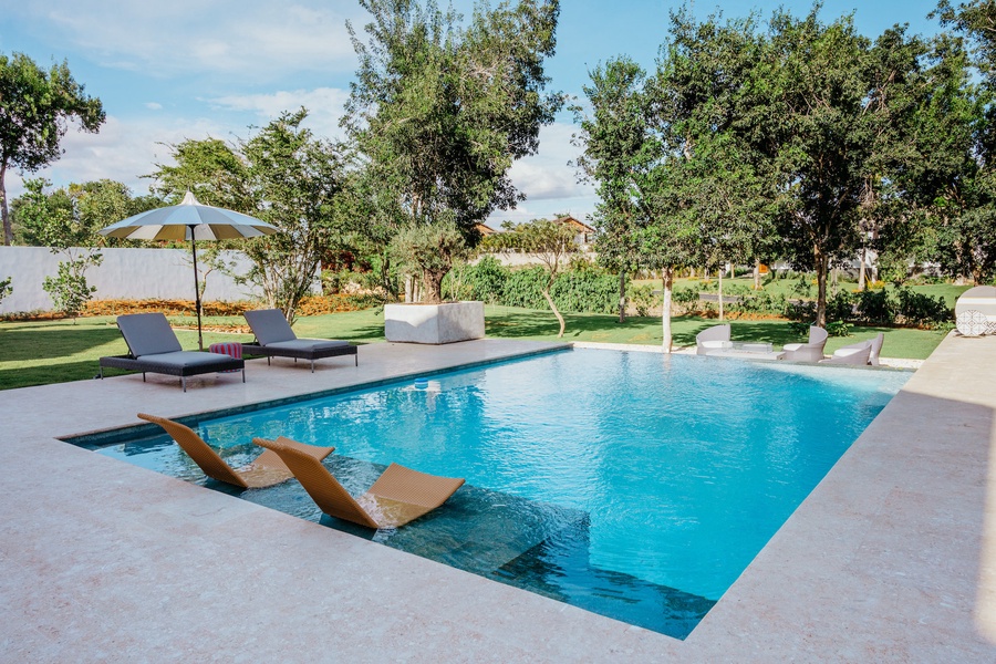 Lounge by the pool and experience the serene beauty of Dominican Republic.