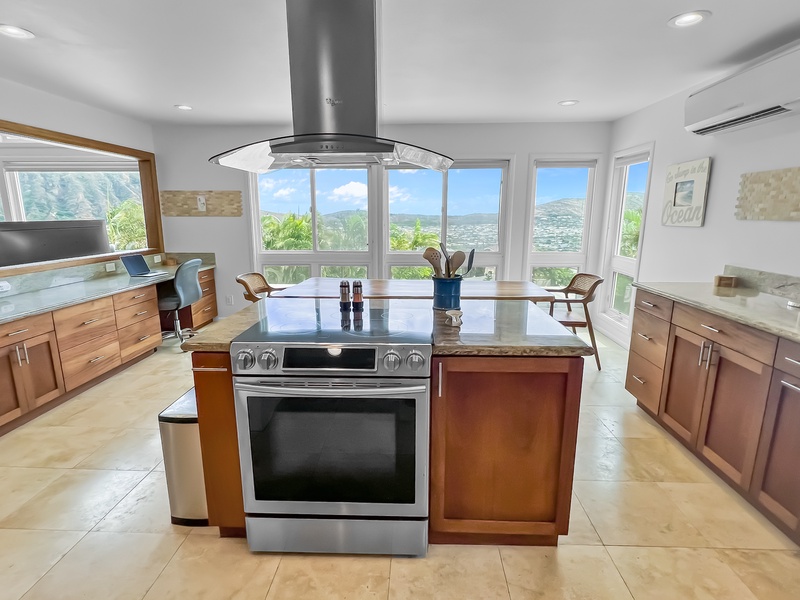 Conveniently prepare your meals in the kitchen with a view!