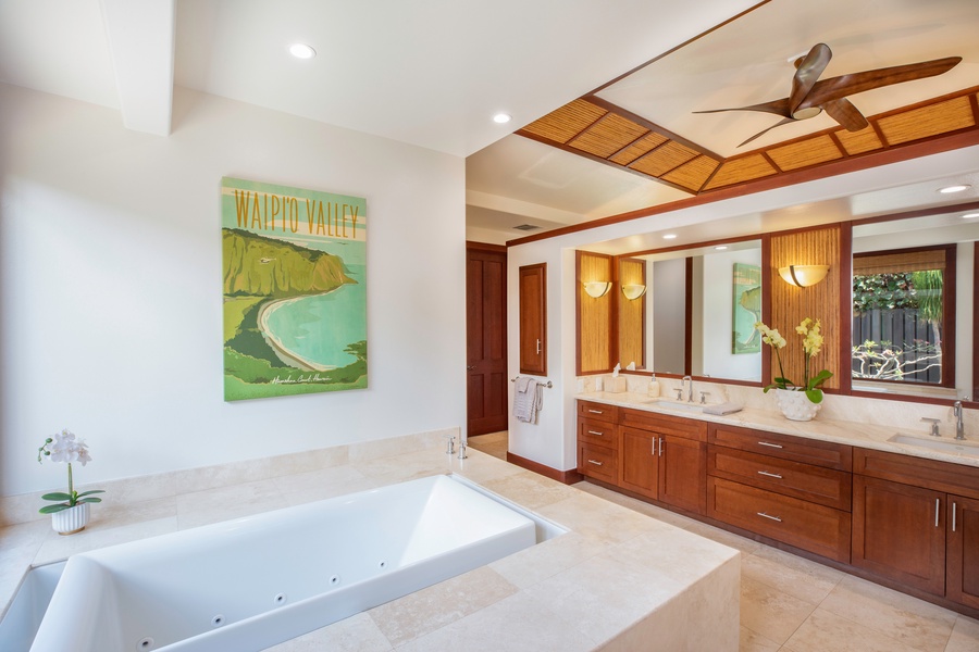 Marble bathroom with shower and jetted tub