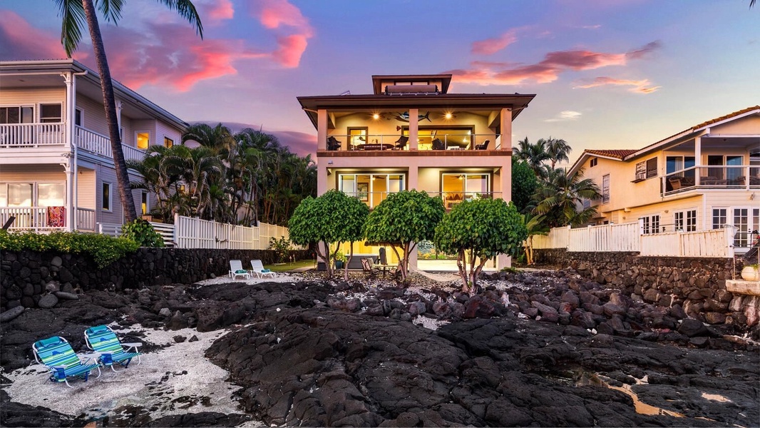 Golden façades meet pink-lavender skies, setting the perfect scene for an evening mai tai on either lanai.