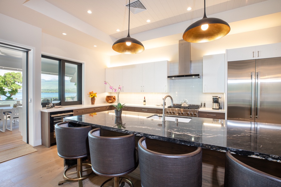 Elegant kitchen island/bar, the hub for casual chats or pre-dinner festivities.