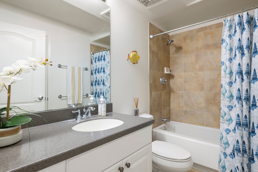 The second full bathroom offers a shower/tub combo and thoughtful touches—ideal for guests or shared accommodations.