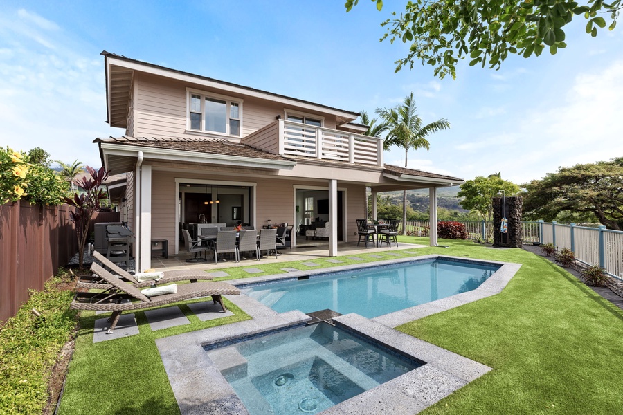 Unwind in the hot tub as you take in the serene tropical surroundings.