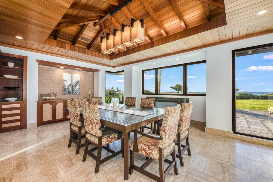 Dine and lounge indoors or out—the living space flows effortlessly to extensive lanais.