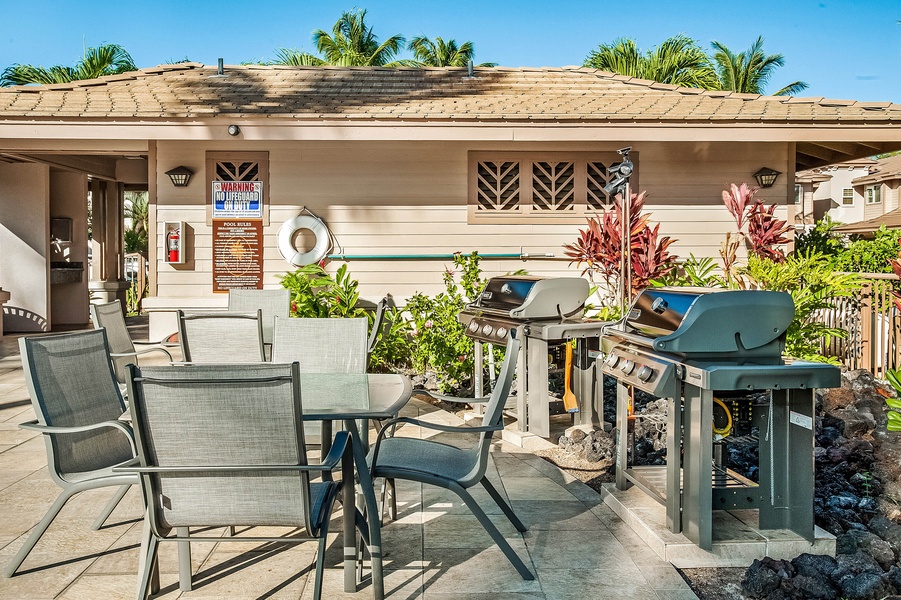 Grill and dine with friends at the outdoor BBQ pavilion located within the swimming pool complex—complete with shaded seating.