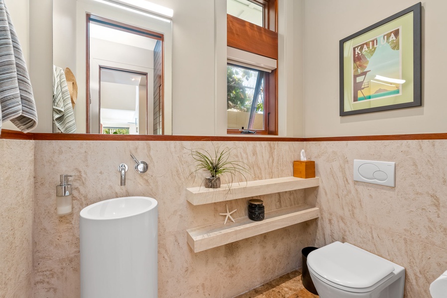 Powder Room featuring modern and luxurious fixtures.