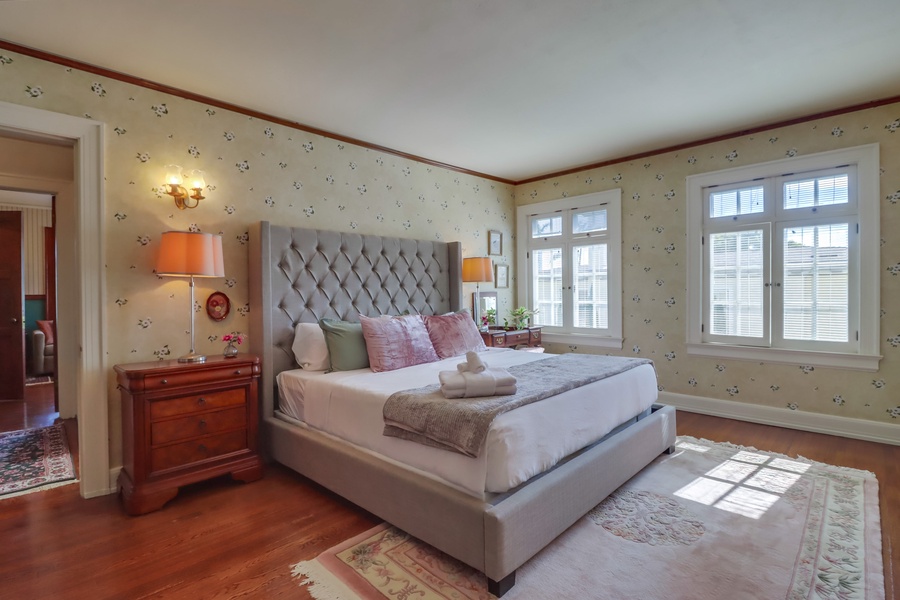 Guest suite 3, located across the hall from the primary bedroom, features a king-sized bed.