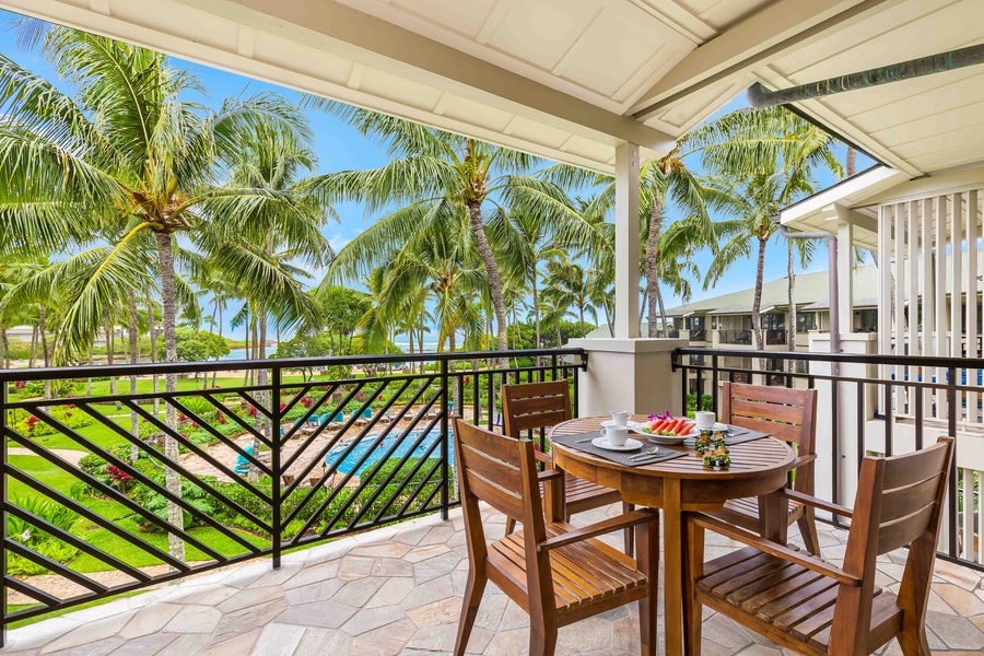 Lanai has views of the pool and distant ocean