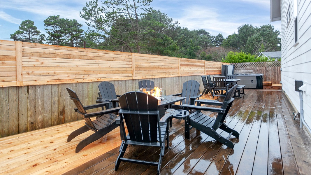 Head out to the back of the home for some stellar outdoor amenities like this fire pit