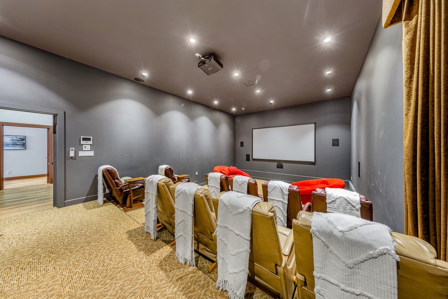 Settle into our home cinema with plush seating and state-of-the-art surround sound.