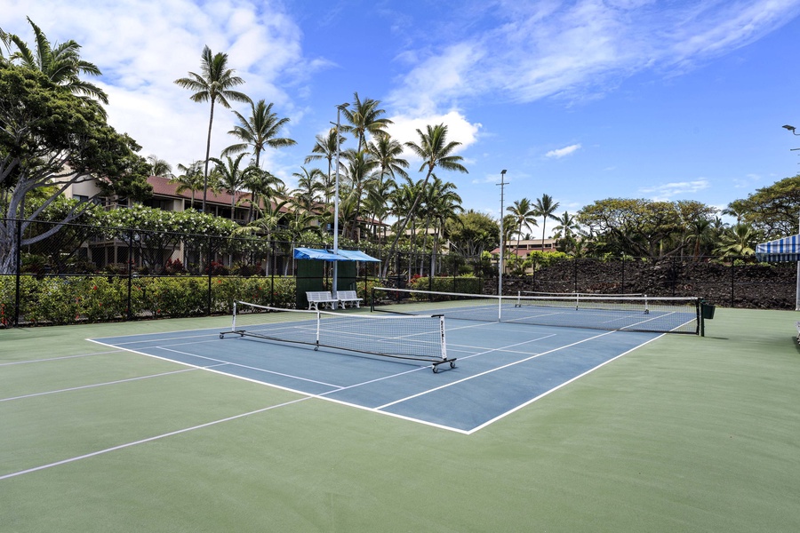 Challenge friends to a game on our well-maintained tennis court surrounded by lush greenery.
