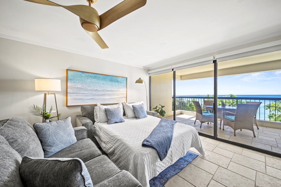 The queen sleeper sofa provides flexible sleeping space with stunning views and easy lanai access.