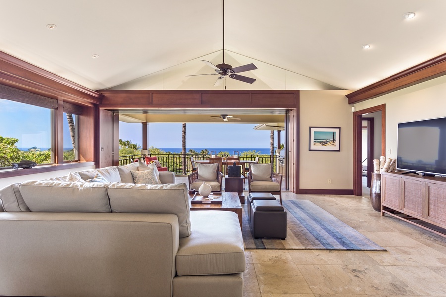 Living area with ample seating and ocean views.