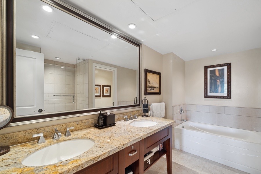Rejuvenate in the luxurious ensuite bathroom at Honua Kai Konea 204—your private spa after a day on the beach.