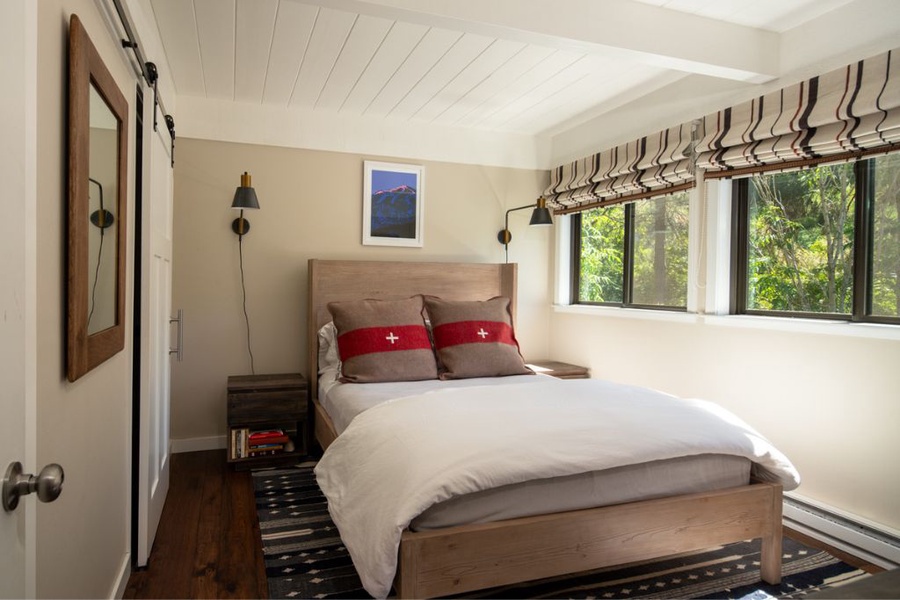 Enjoy the cozy guest bedroom with full size bed and plenty of natural light.