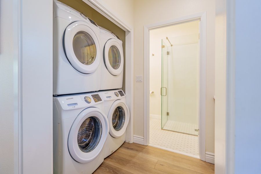 The washer and dryer located conveniently next to the downstairs half bathroom.