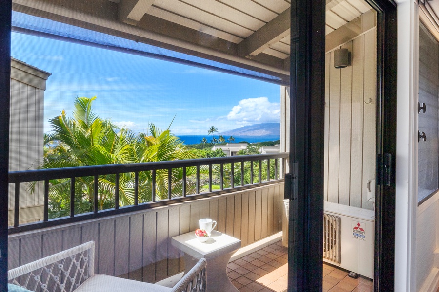 Enjoy your morning coffee on the primary's private lanai.