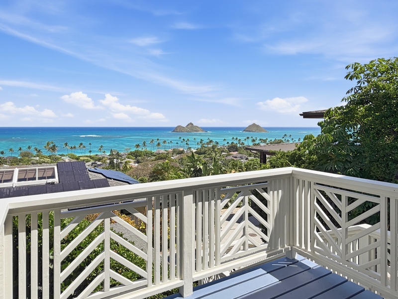 Unforgettable ocean panorama vies showcase crystal-clear turquoise waters, tropical islands, and palm-lined coastline from this elevated property location.