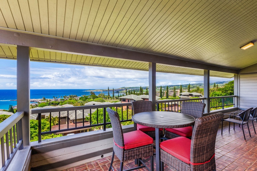 Enjoy breathtaking ocean views from this cozy lanai, perfect for morning coffee or evening cocktails.