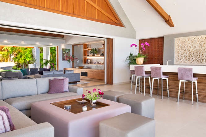 Covered outdoor lounge with bar—perfect for poolside drinks, ocean breezes, and entertaining.