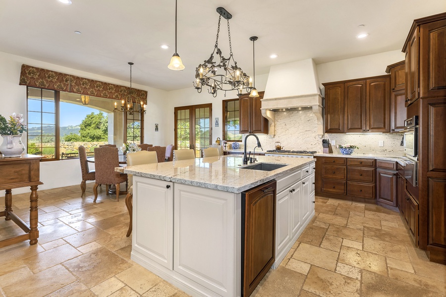 The gourmet kitchen is a chef's dream, with high-end appliances and ample counter space to create a stunning farm-to-table meal