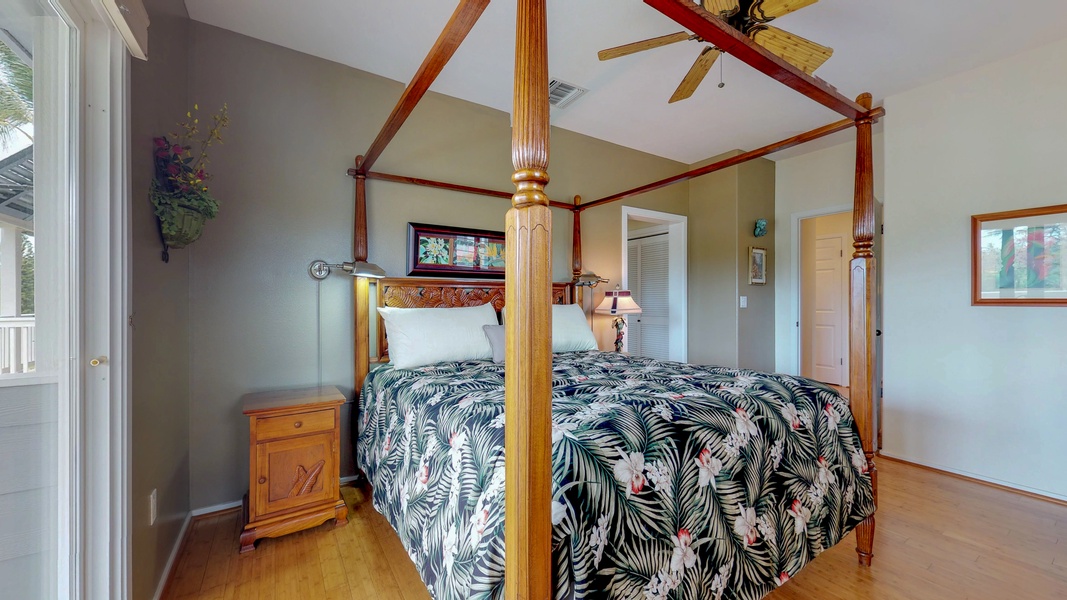 The upstairs primary guest bedroom is spacious and comfortable.