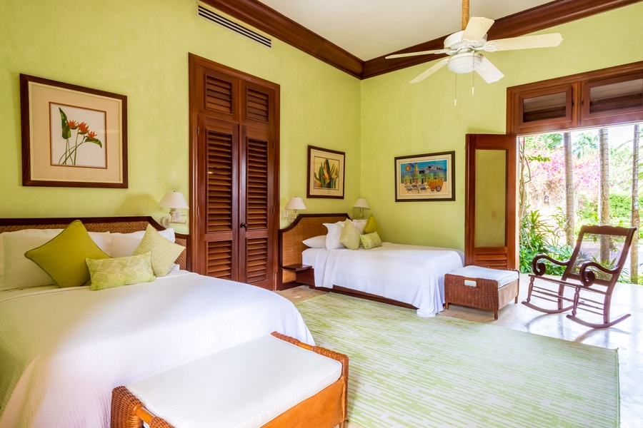 The guest bedroom has two double beds.
