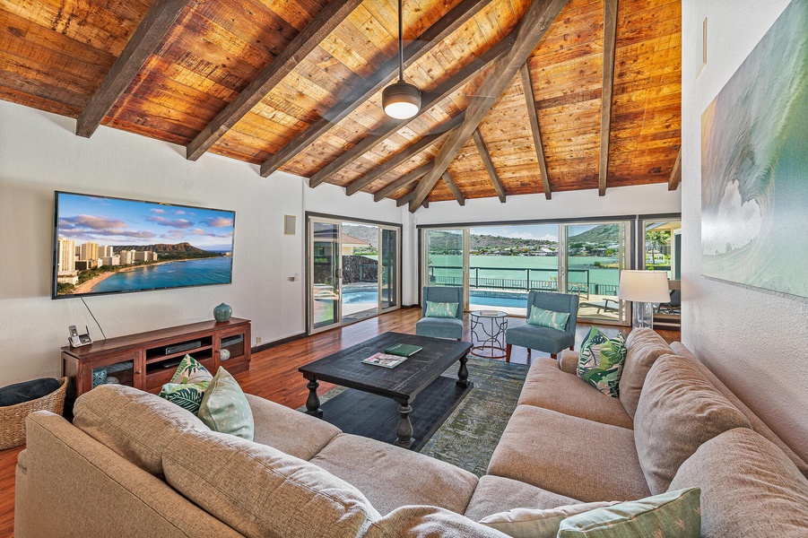 Main living room with pool and stunning marina views.