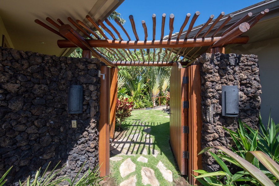 Guava Branches and Ohia Wood Comprise the Gated Entryway into your Private Courtyard
