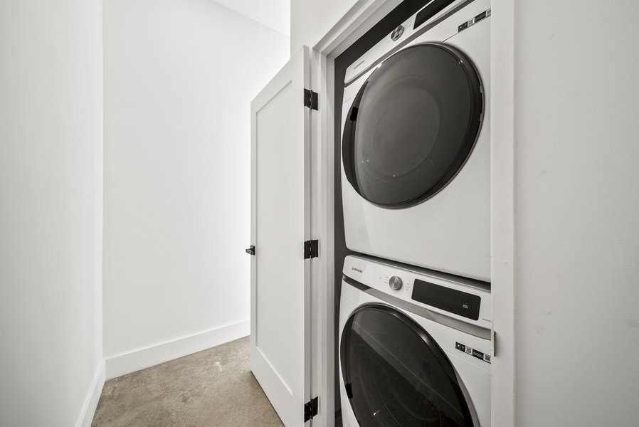 An in-unit washer and dryer provide added convenience for longer stays.