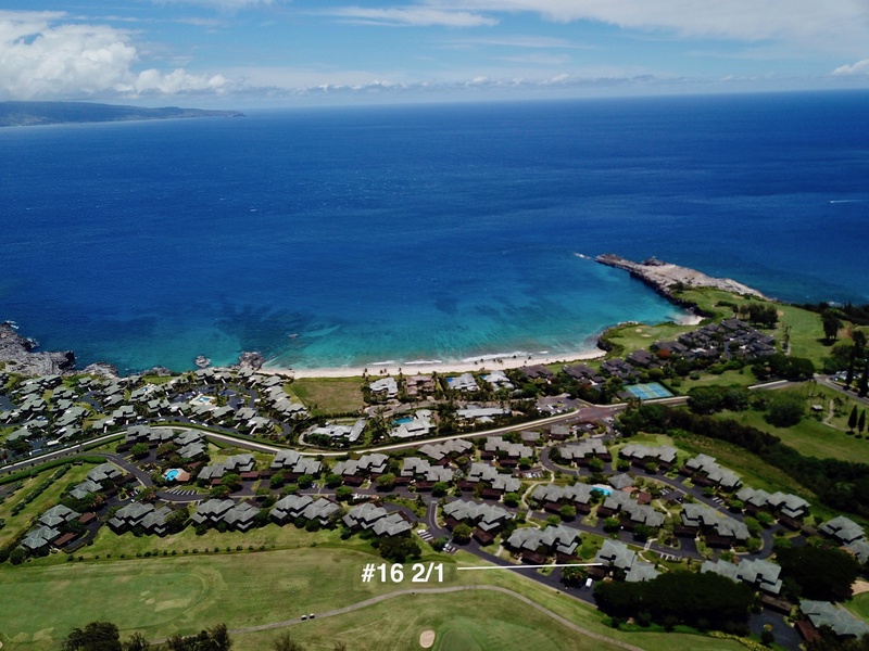 This aerial view offering stunning ocean views and close proximity to the beach.