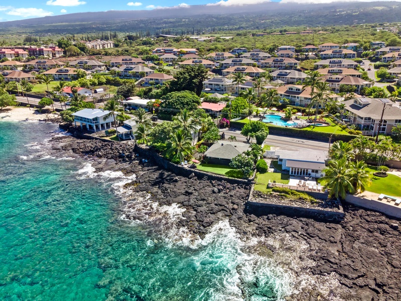 Aerial view showcasing the home’s prime oceanfront position along Ali‘i Drive.